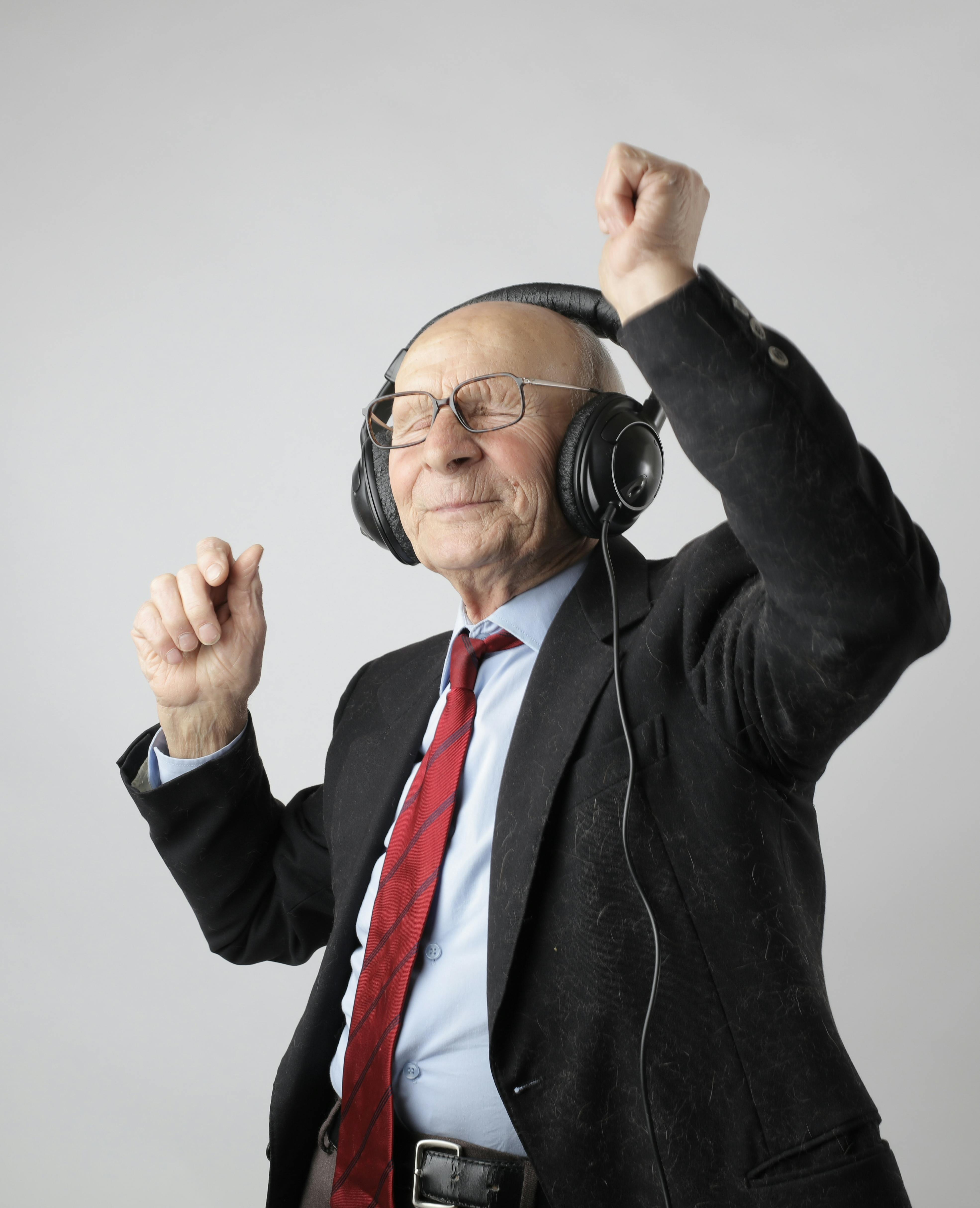 Image of old man with headphones